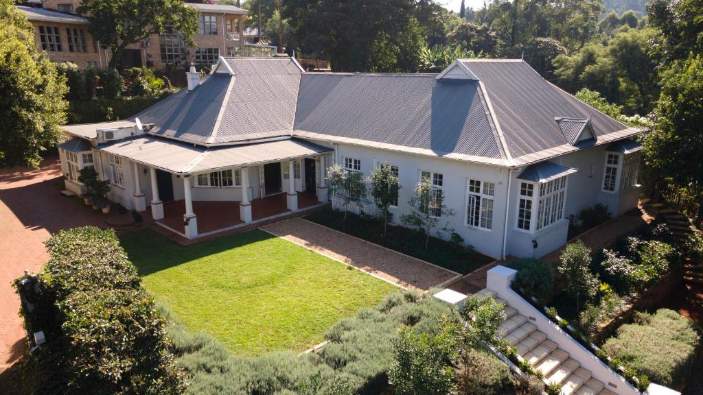 an aerial view of a white house at Taunton Manor in Pietermaritzburg