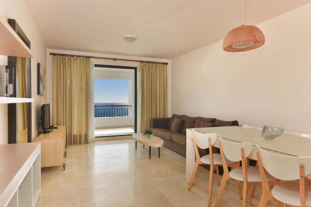 Khu vực ghế ngồi tại Impresionante apartamento vista mar frontal