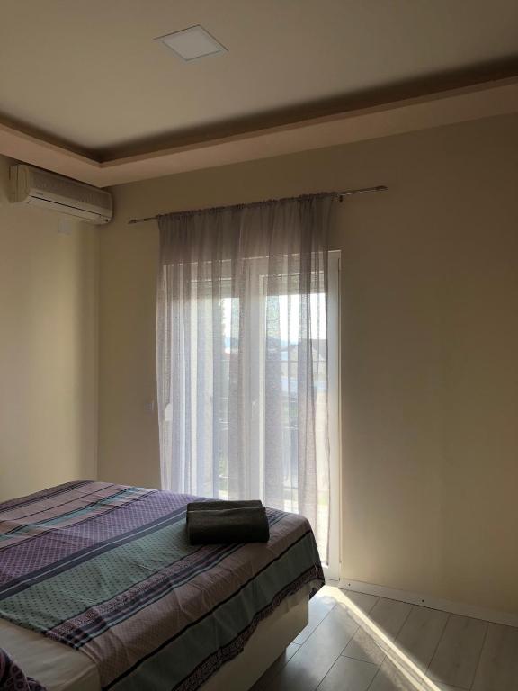 Posteľ alebo postele v izbe v ubytovaní Guesthouse Adriatic