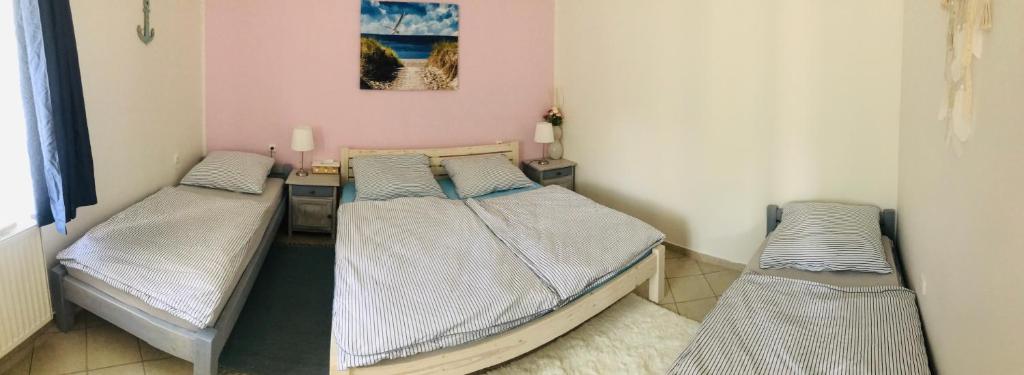 Postel nebo postele na pokoji v ubytování Apartmán U ŘEKY