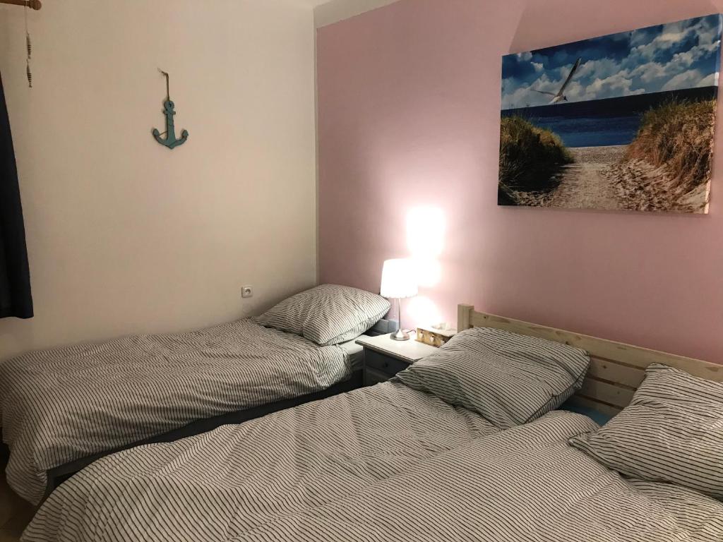 Postel nebo postele na pokoji v ubytování Apartmán U ŘEKY