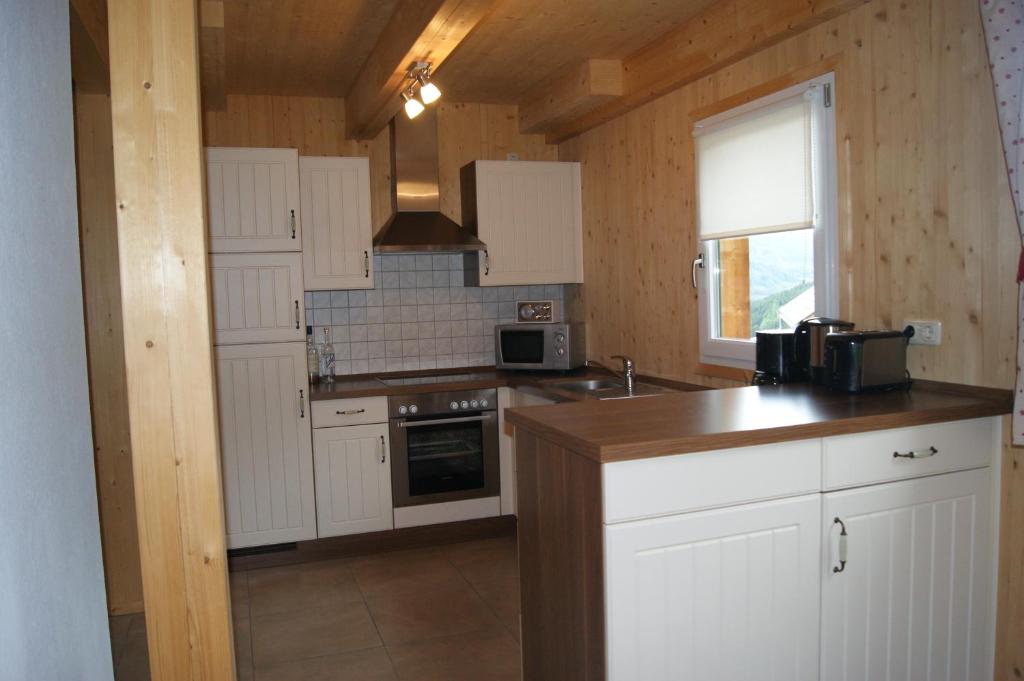 Kuchyň nebo kuchyňský kout v ubytování The Lodge