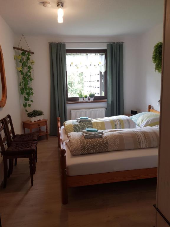 Postel nebo postele na pokoji v ubytování Ferienwohnung Greilitz beim Forstsee