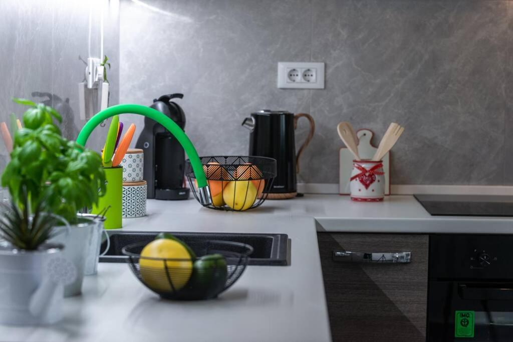 Η κουζίνα ή μικρή κουζίνα στο Apartman Leda