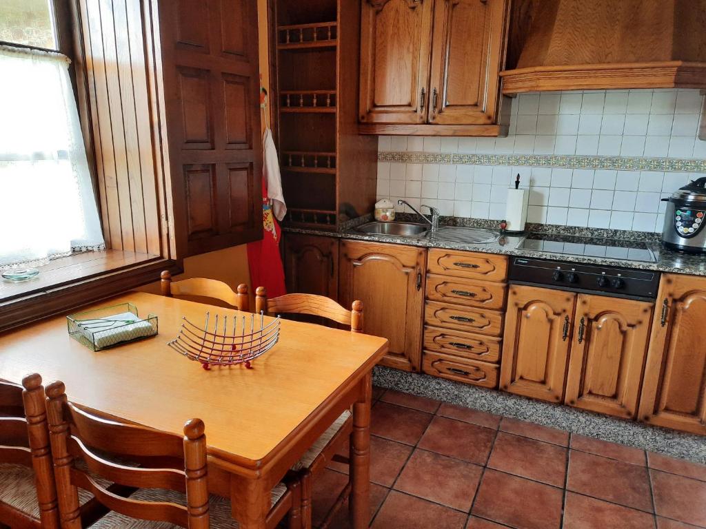 Kuchyň nebo kuchyňský kout v ubytování Casa Viduedo