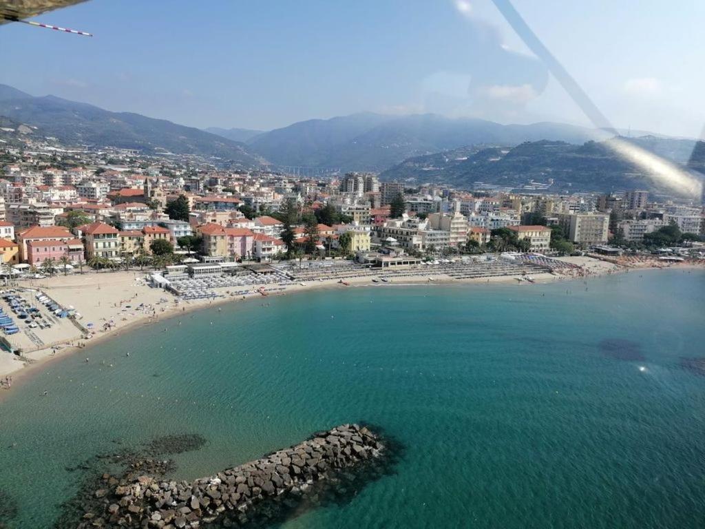 an aerial view of a beach and a city at Hotel Svizzera in Arma di Taggia