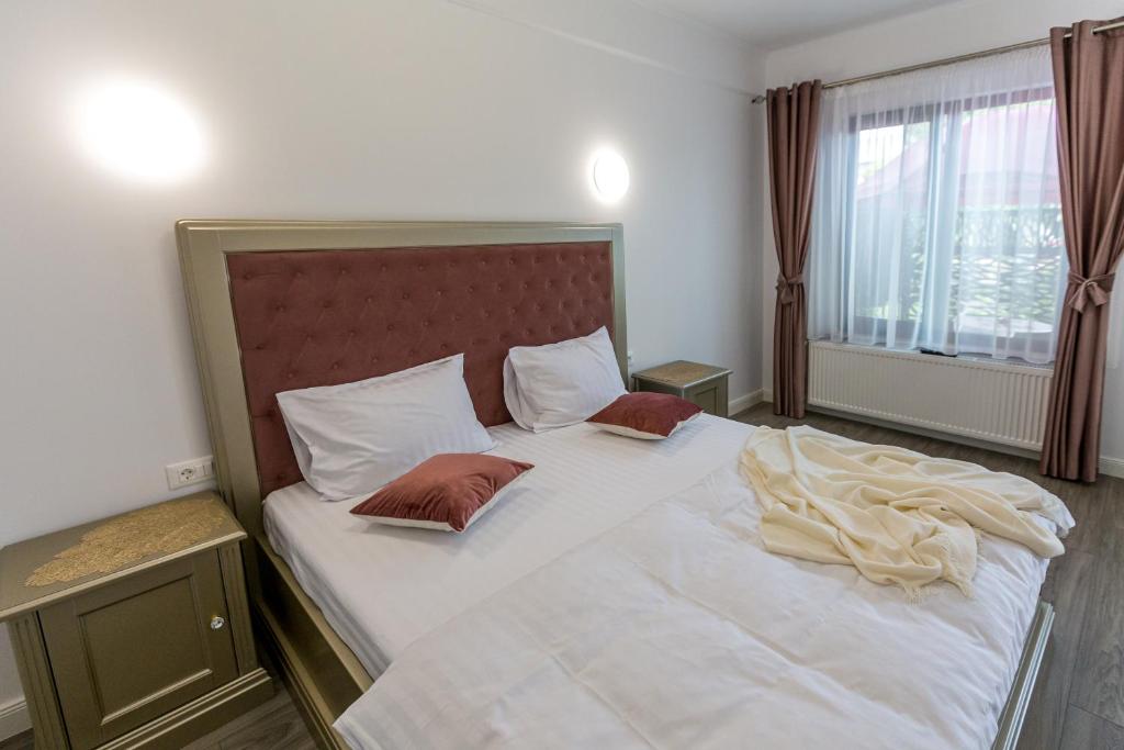 Postel nebo postele na pokoji v ubytování Brize Guesthouse
