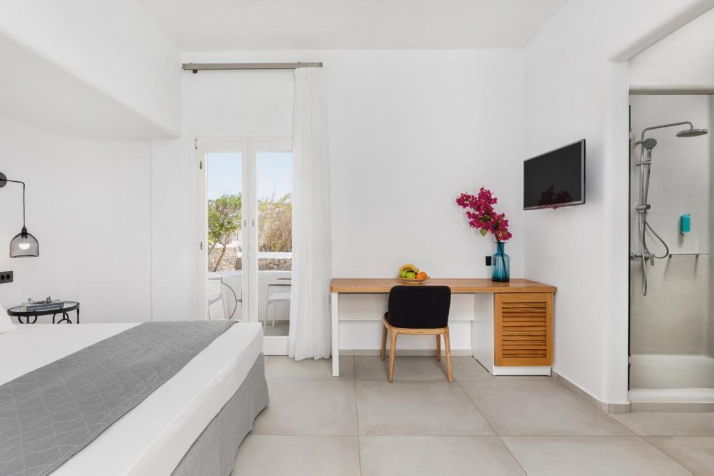Postel nebo postele na pokoji v ubytování Corfos Hotel