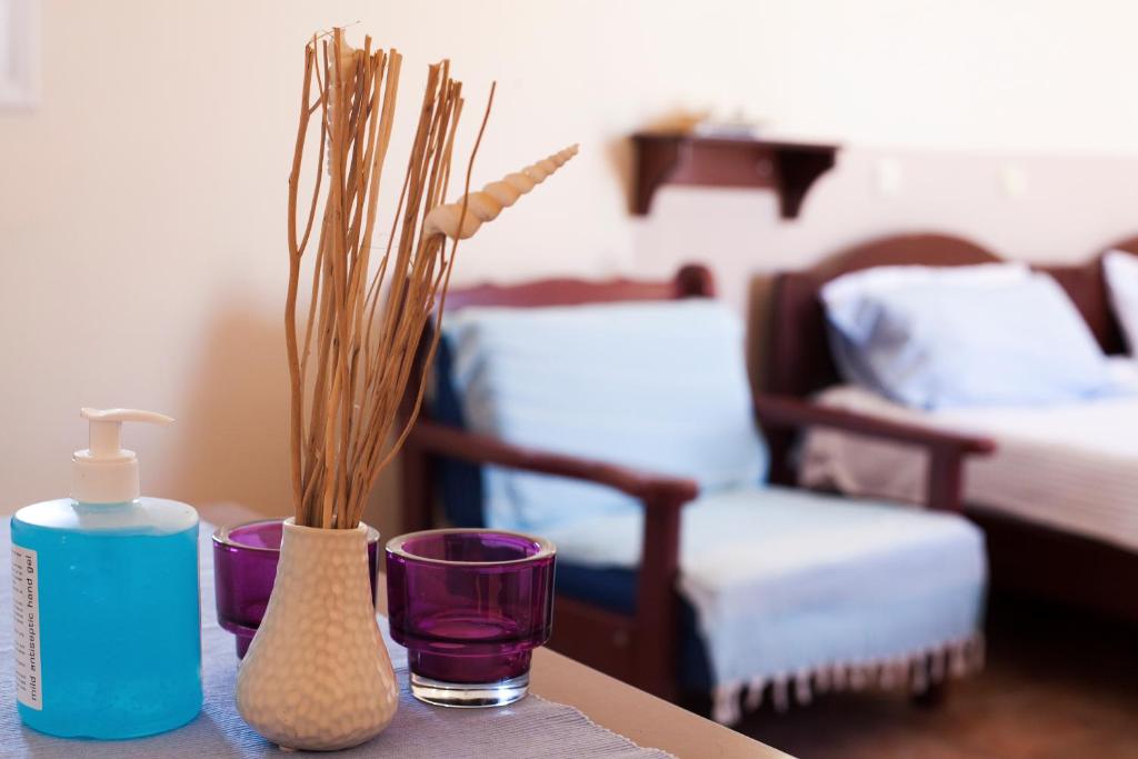 Postel nebo postele na pokoji v ubytování Guesthouse Perdikouli