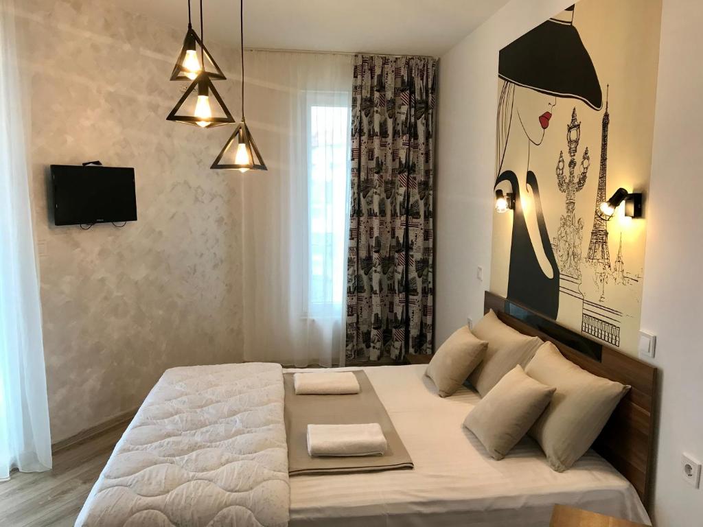 A bed or beds in a room at Apartment RAYA