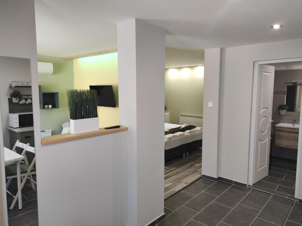 Postel nebo postele na pokoji v ubytování 7 days Apartment