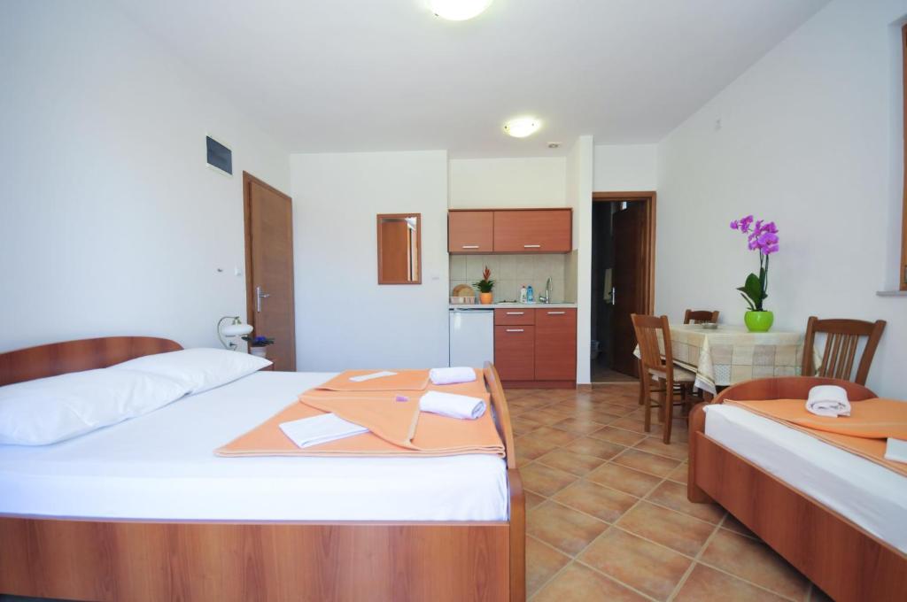 Postel nebo postele na pokoji v ubytování TILIA Apartments