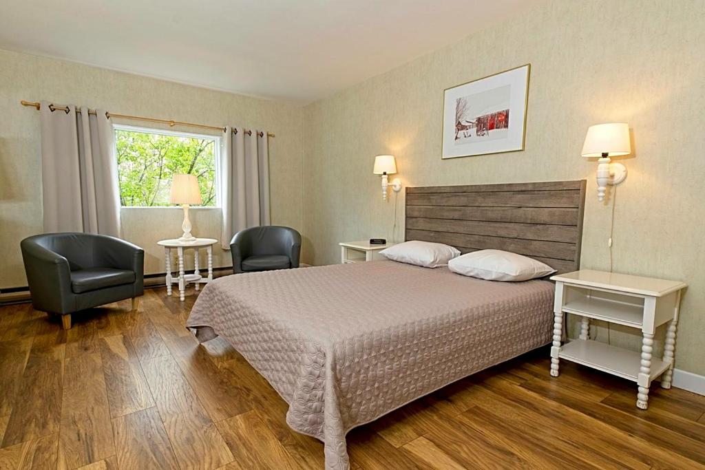 Katil atau katil-katil dalam bilik di Auberge Les Sources