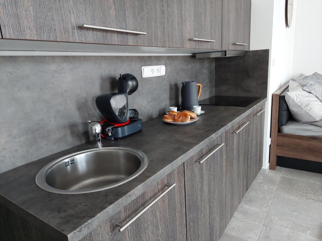 Kuchyň nebo kuchyňský kout v ubytování Apartmán Rezidence Javor Železná Ruda