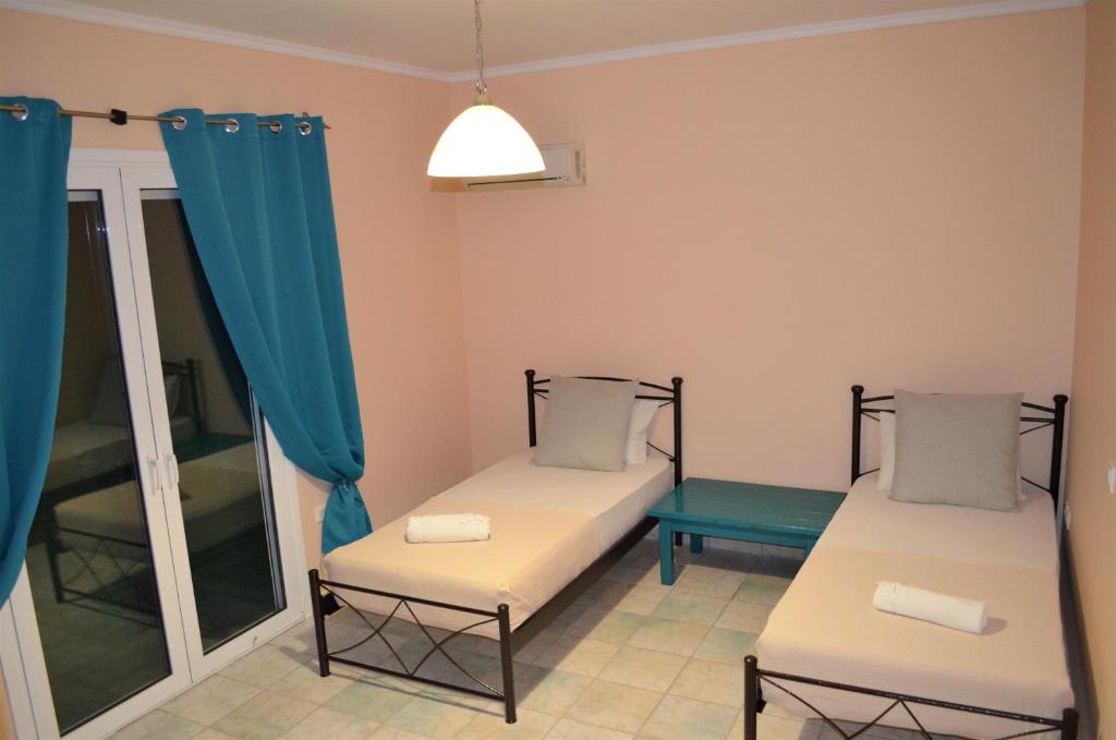 A bed or beds in a room at Elatia Villa