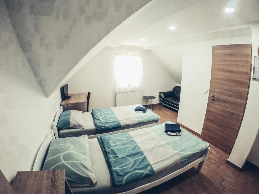 Postel nebo postele na pokoji v ubytování Apartment and rooms Maraton