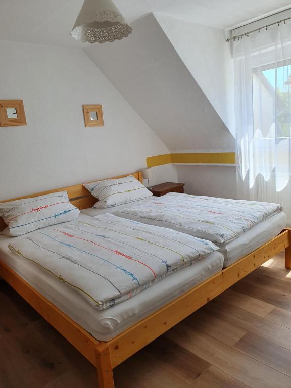 Postel nebo postele na pokoji v ubytování Haus Zwanzig