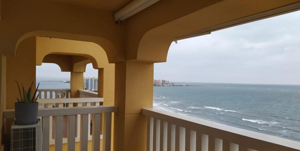 a balcony with a view of the ocean at Apartamento Dos mares I in La Manga del Mar Menor