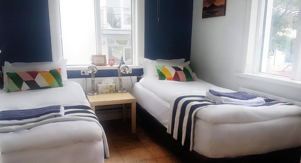 Postel nebo postele na pokoji v ubytování Refurinn Reykjavik Guesthouse