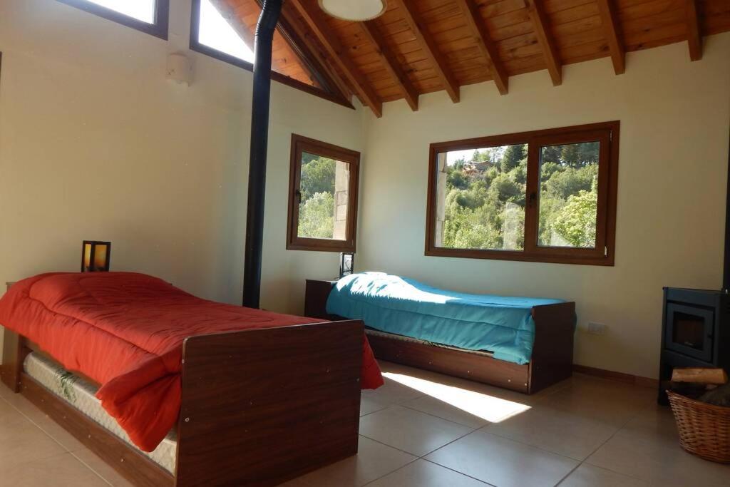 Ένα ή περισσότερα κρεβάτια σε δωμάτιο στο PIUKEWEN