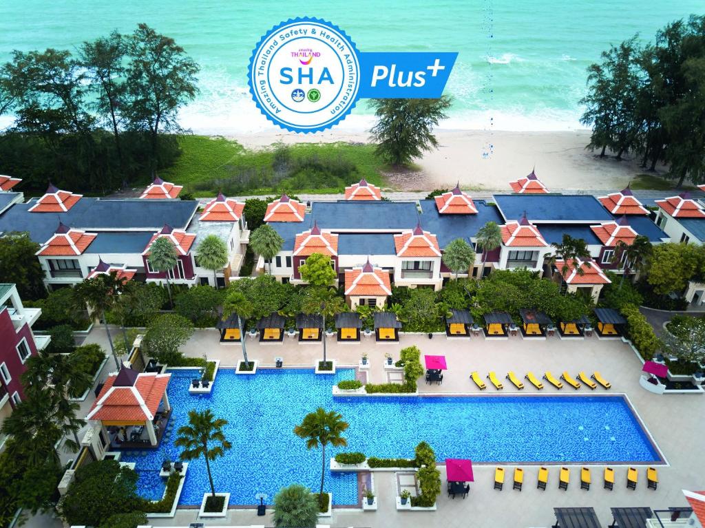 an aerial view of the resort with the shka plus logo at Mövenpick Resort Bangtao Beach Phuket in Bang Tao Beach