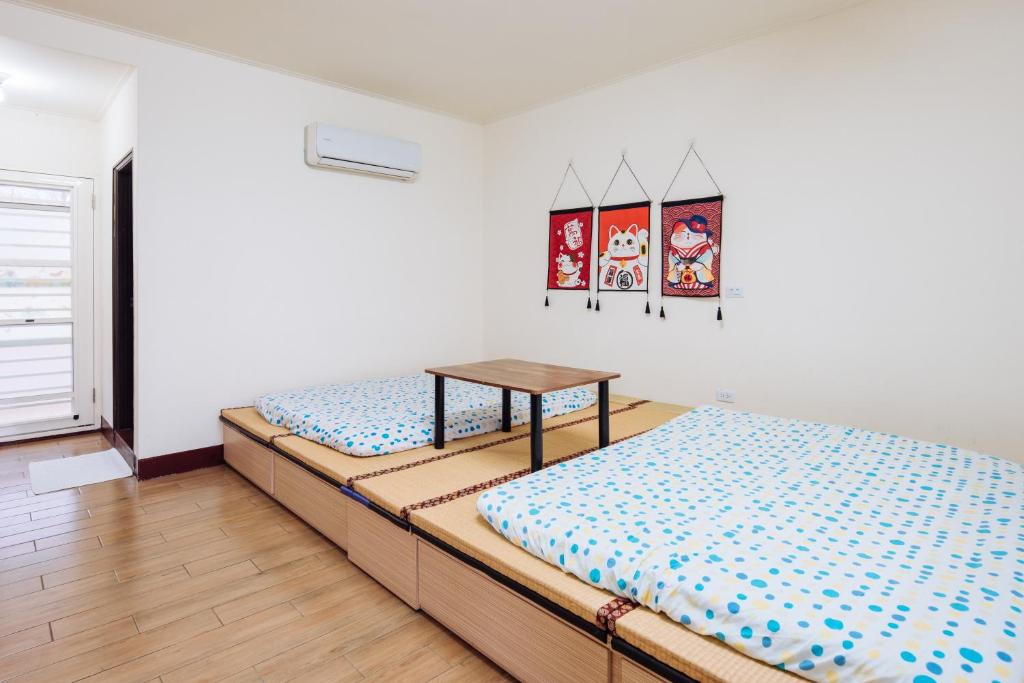 Postel nebo postele na pokoji v ubytování Urarakana B&B