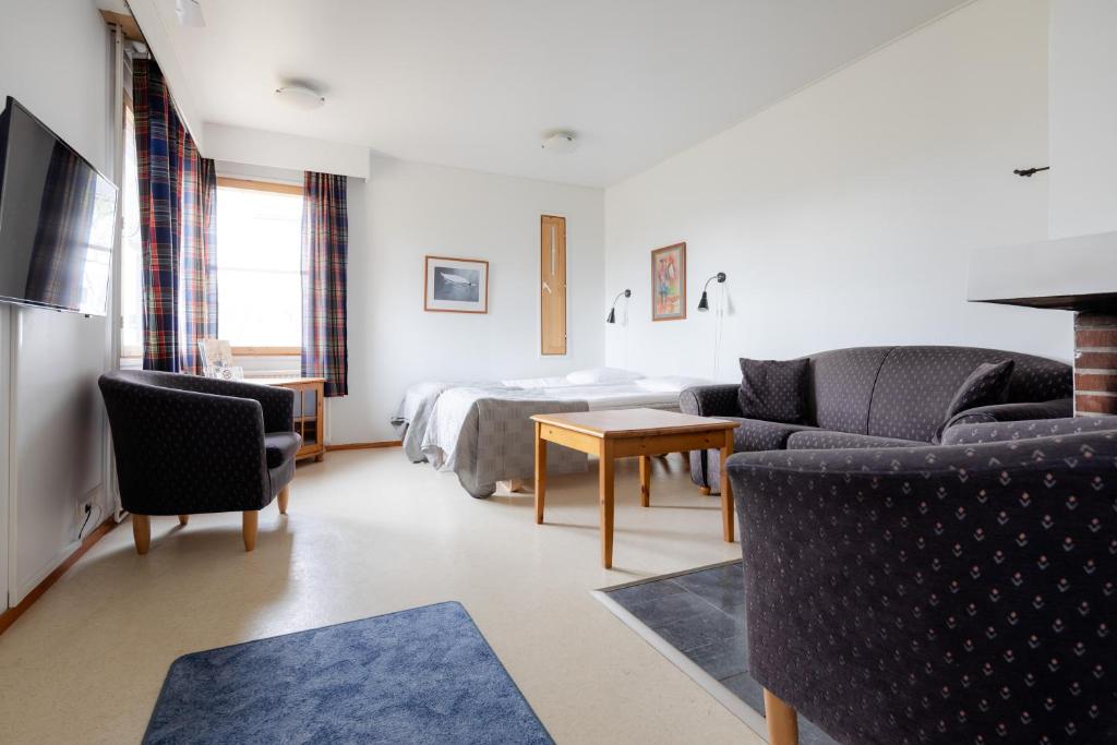 TV a/nebo společenská místnost v ubytování Lapland Hotels Kilpis
