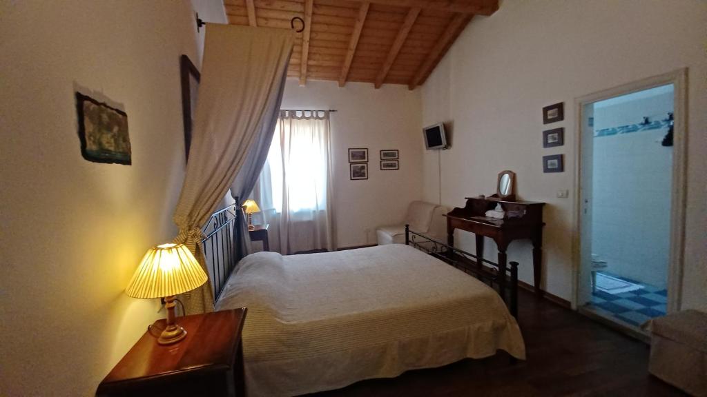 Postel nebo postele na pokoji v ubytování Porta del Mare