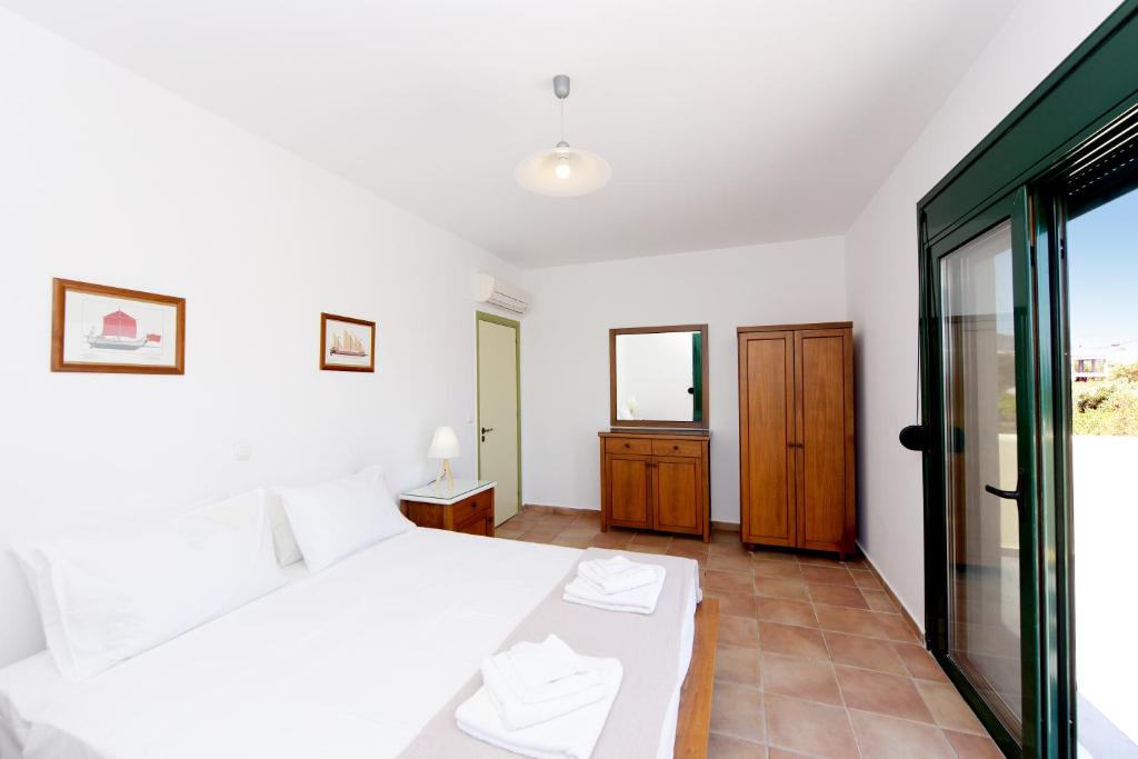 A bed or beds in a room at Seaside Villa