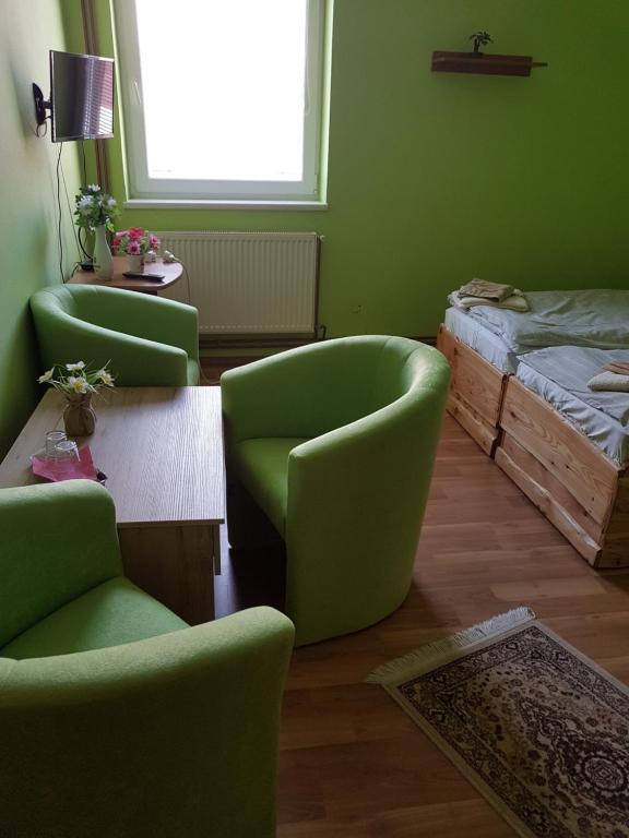 Posteľ alebo postele v izbe v ubytovaní FAN FAN PENZIÓN