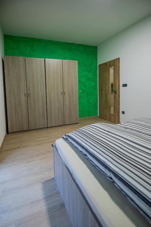 Postel nebo postele na pokoji v ubytování Apartmány pod Jeřábem, Šanov 67, Červená Voda