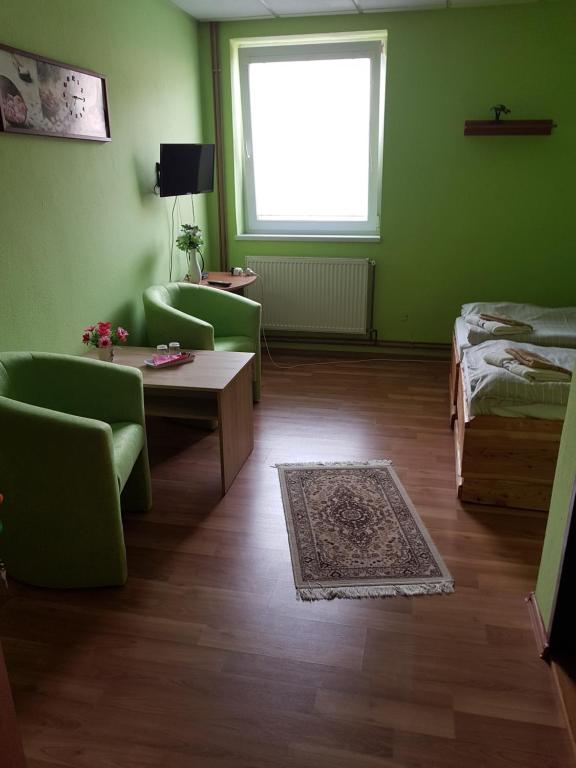 Posteľ alebo postele v izbe v ubytovaní FAN FAN PENZIÓN