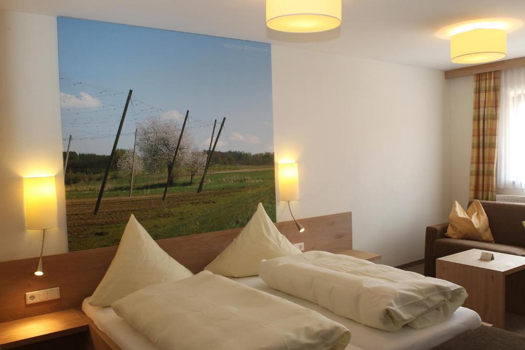 Postel nebo postele na pokoji v ubytování Gasthof Bogenrieder