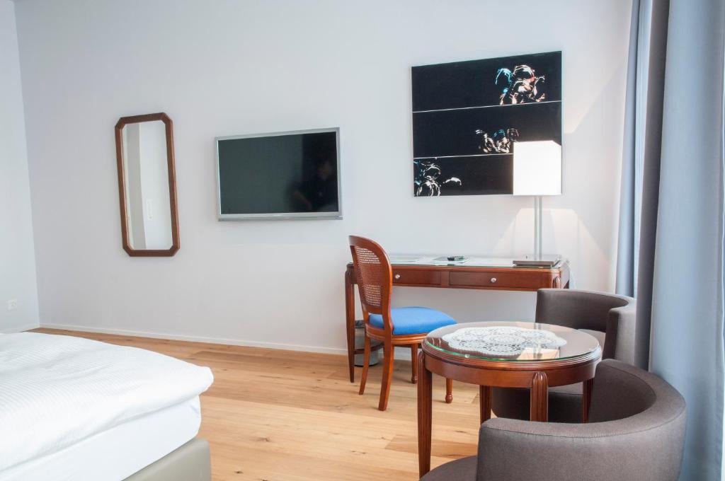 TV a/nebo společenská místnost v ubytování Romantik Hotel Beau Rivage Weggis