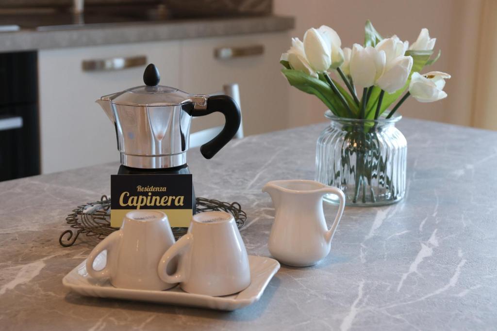 Set per la preparazione di tè e caffè presso Residence Capinera