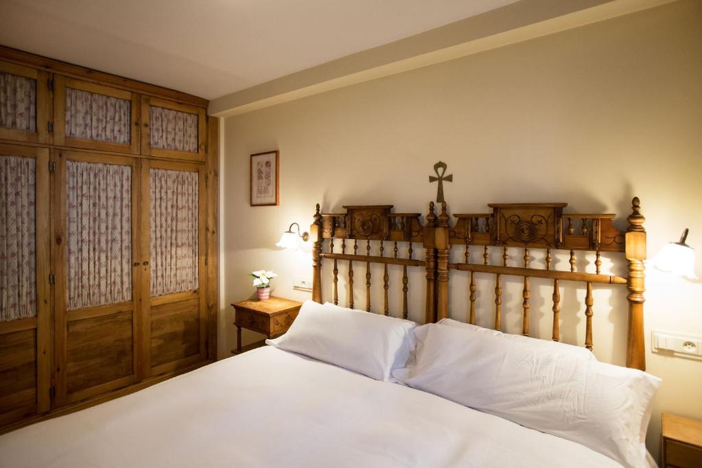 Postel nebo postele na pokoji v ubytování Wood ✪ WiFi, terraza ✪ Ideal excursiones