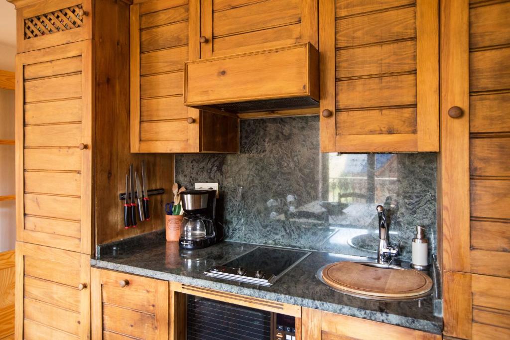 Kuchyň nebo kuchyňský kout v ubytování Wood ✪ WiFi, terraza ✪ Ideal excursiones