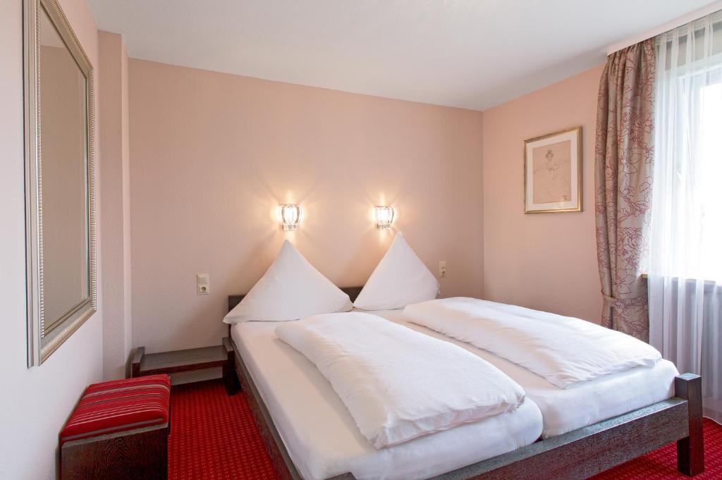 Postel nebo postele na pokoji v ubytování Ferienresort am Mattenweg