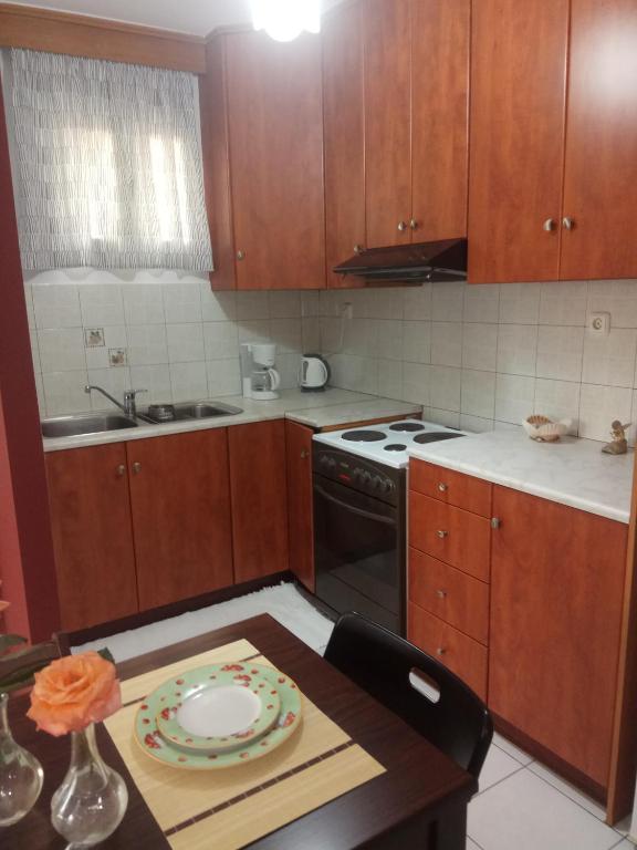 A kitchen or kitchenette at Blue apartment