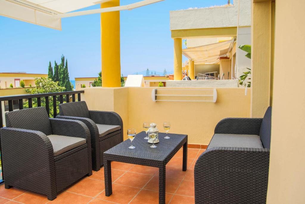 Balkón nebo terasa v ubytování OleHolidays Romana Playa 336 vistas al mar