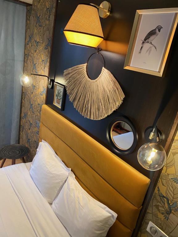 Postel nebo postele na pokoji v ubytování Cors'Hotel