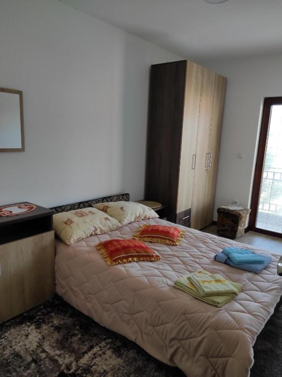 Postel nebo postele na pokoji v ubytování Apartman Vukan