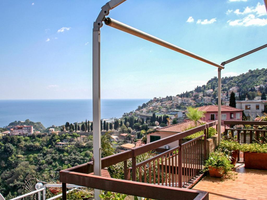 a balcony with a view of the ocean at Apartment Ikebana by Interhome in Taormina