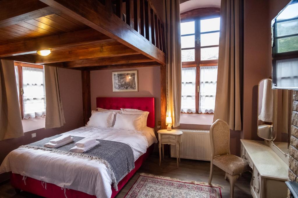 Voodi või voodid majutusasutuse The Old School Boutique Hotel toas