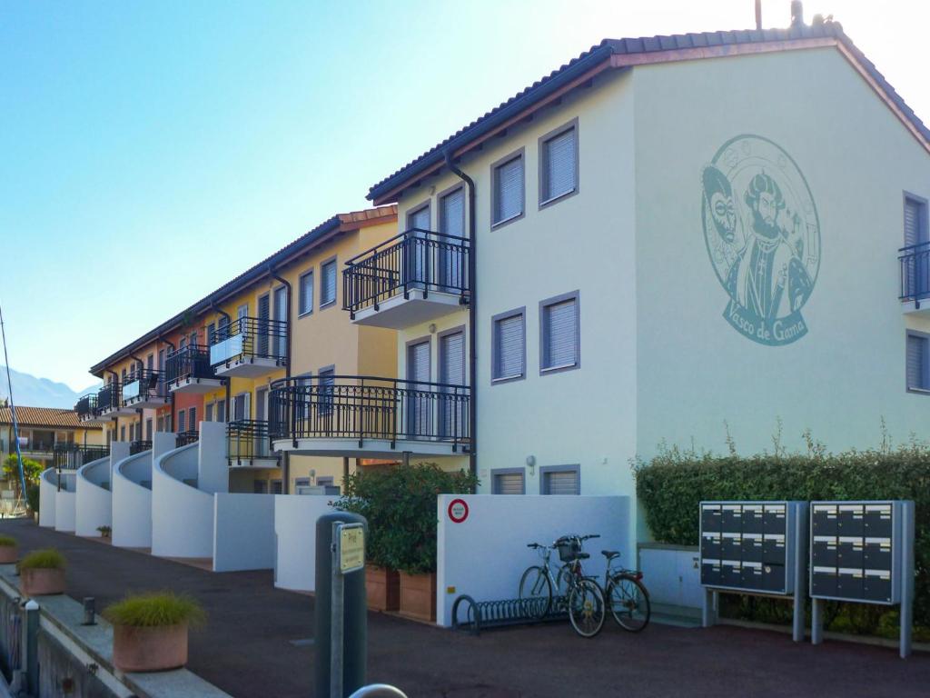 a building with a mural on the side of it at Apartment Vasco de Gama B11-R by Interhome in Bouveret
