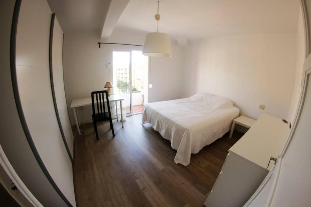 Posteľ alebo postele v izbe v ubytovaní APARTEMENTO MODERNA CERCA PLAYA Y CENTRO PARA FAMILIA POBLA 10