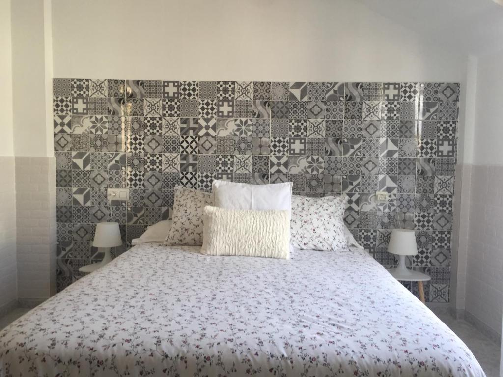 Posteľ alebo postele v izbe v ubytovaní Apartamentos Playa Portonovo