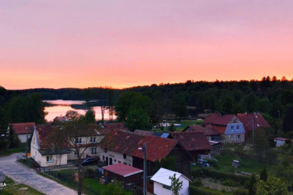 an aerial view of a town at sunset at Apartament Stare Jabłonki in Stare Jabłonki