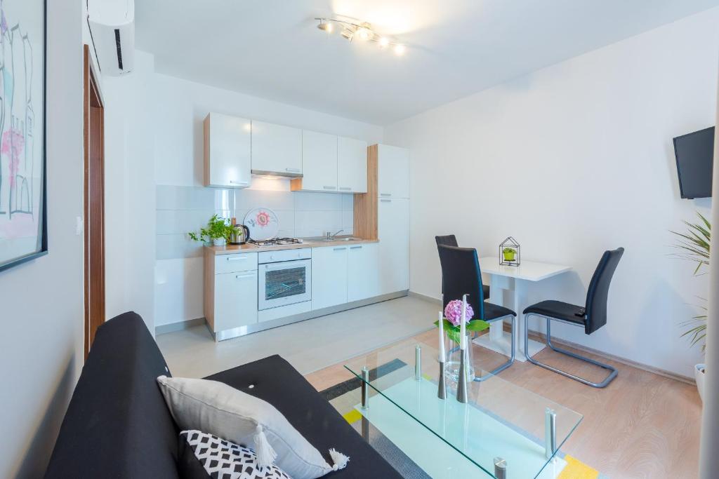 Kuchyň nebo kuchyňský kout v ubytování Apartments Villa Made 4U