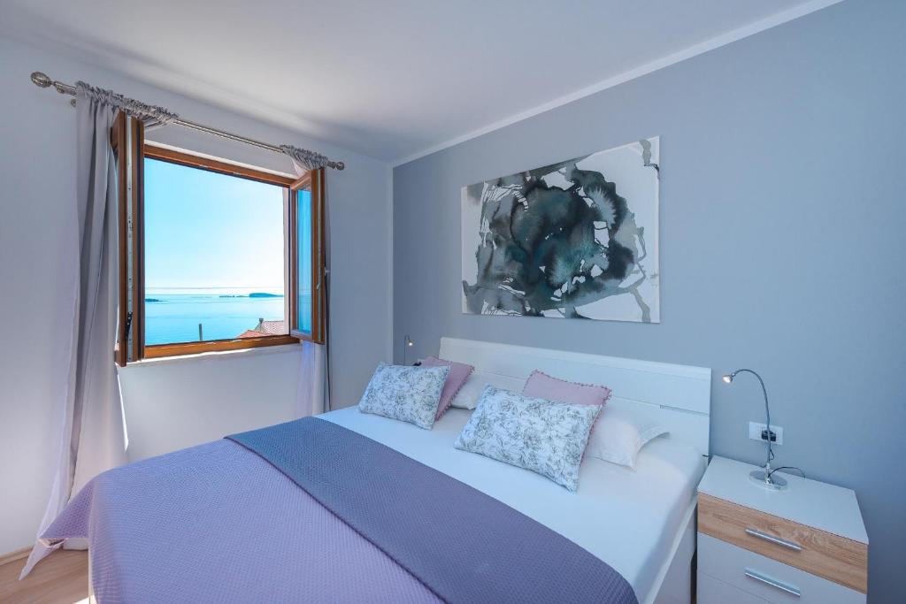 Postel nebo postele na pokoji v ubytování Apartments Villa Made 4U